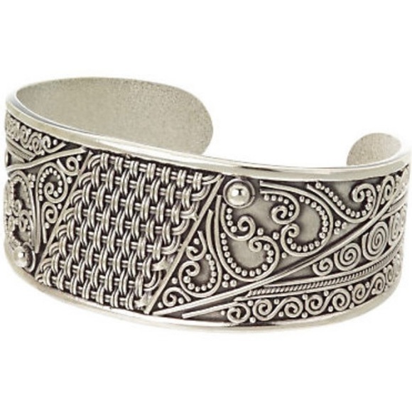 Artisan crafted Sterling silver cuff bracelet.